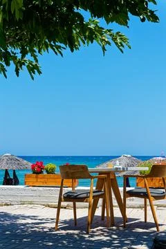 Tables at the beach road Stock Photos