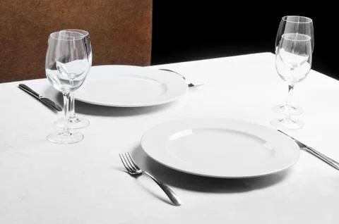 Tables set for  meal Stock Photos