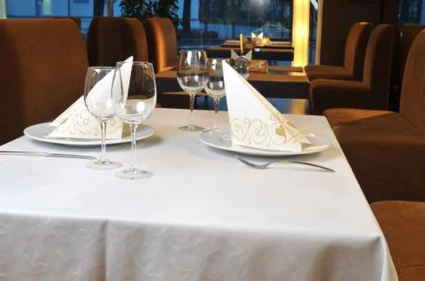 Tables set for  meal Stock Photos