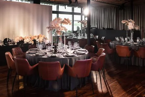 Tables set for wedding or another catered event dinner Stock Photos