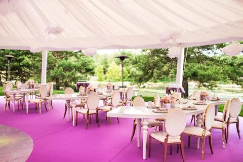 Tables sets for wedding or another catered event dinner Stock Photos