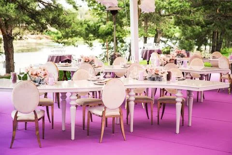 Tables sets for wedding or another catered event dinner Stock Photos