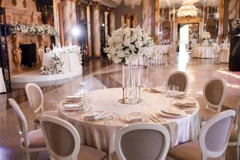 Tables setting at a luxury wedding. Table for guests. Dishes and drinks. Wedd Stock Photos
