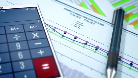 Tablet and ballpoint pen on documents with a graph of financial ratios. Stock Footage 81729109