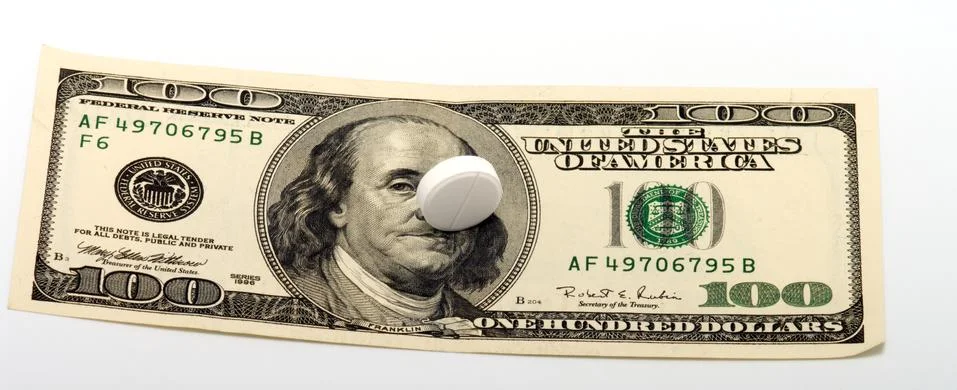 Tablet and dollars. Stock Photos