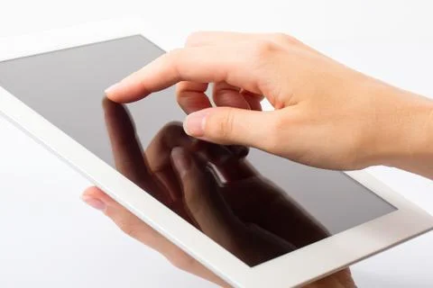 Tablet and Hands on White Background Stock Photos