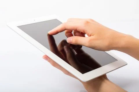 Tablet and Hands on White Background Stock Photos