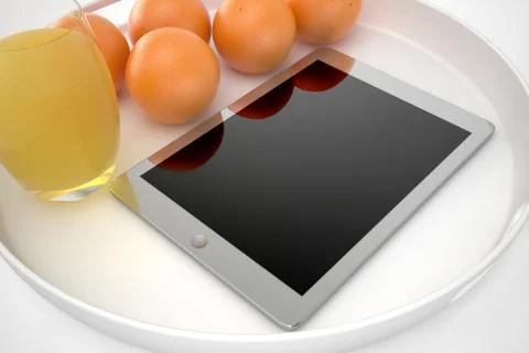 Tablet and juice Stock Photos