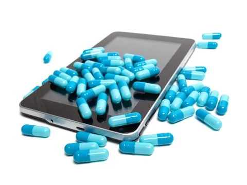 Tablet and pills Stock Photos