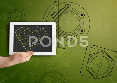 Tablet and plan on green background Stock Photos