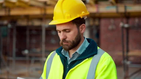 Tablet, architect and man at construction site for development, planning project Stock Footage 336190282