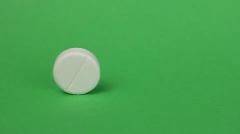 Tablet are rolling on a green background 動画素材 25877401