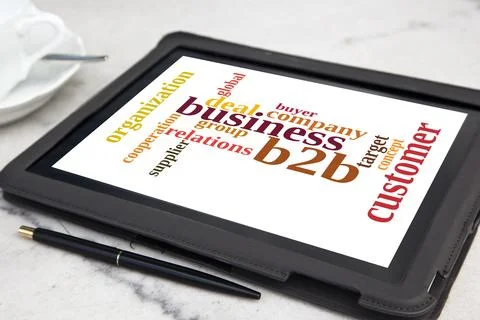 Tablet with b2b word cloud Stock Photos