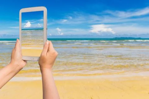 Tablet on the beach Foto stock