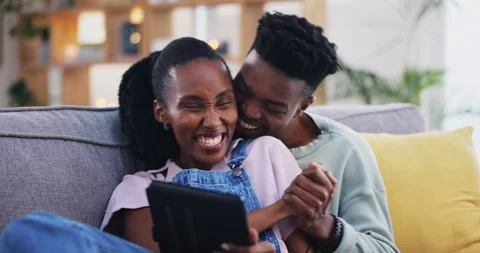 Tablet, black couple and high five on home sofa, celebration and excited in Stock Footage 247757458