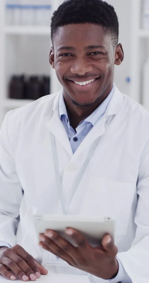 Tablet, black man and face of scientist in laboratory with confidence for Stock Footage 336668282