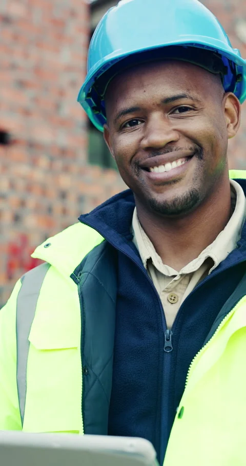 Tablet, black man and face on construction site with smile for building, Stock Footage 336793086