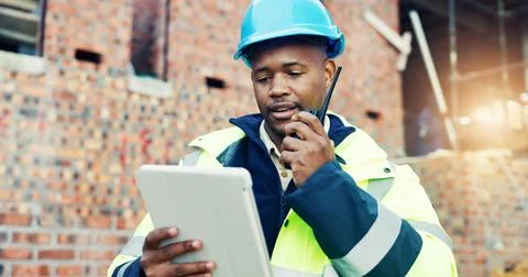 Tablet, black man and planning with radio on construction site with chat fo.. Stock Photos