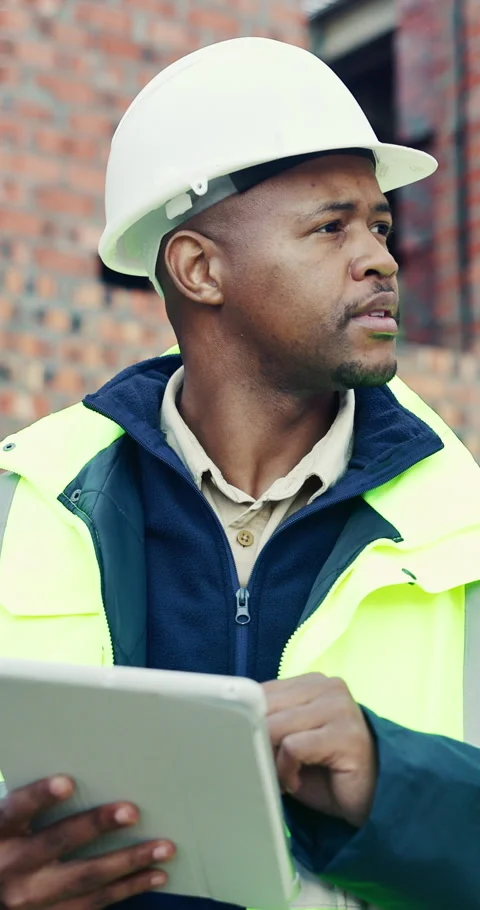 Tablet, black man and thinking on construction site with planning for building, Stock Footage 336794306