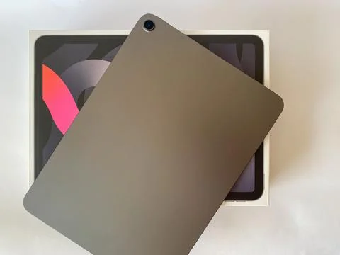 The tablet is black on a white isolated background with a mock up Stock Photos