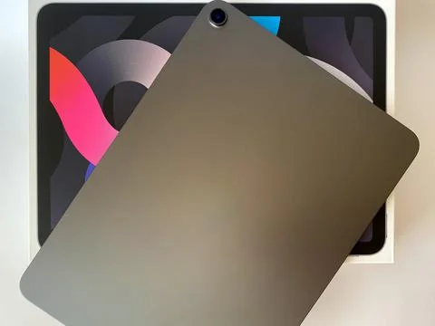 The tablet is black on a white isolated background with a mock up Stock Photos