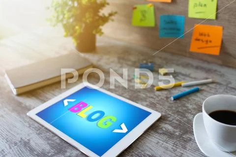 Tablet with BLOG text the on screen. Social network, Communication and internet Stock Photos