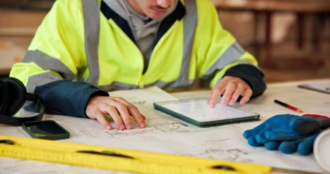 Tablet. blueprint and hands of construction worker on site for repairs, building Video stock 338109314