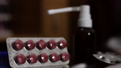 A tablet of brown pills Stock Footage 258796237