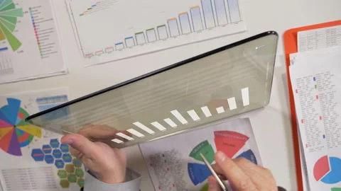 Tablet With Business Charts  Stock Footage 138114099
