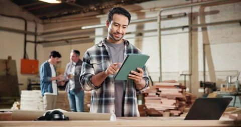 Tablet, carpenter and reading with man in workshop for woodworking inventory, Video stock 338315471