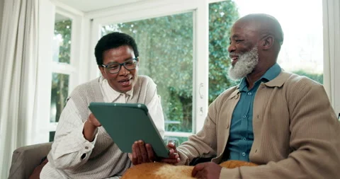 Tablet, chat and search with old couple on sofa for communication, streaming and Stock Footage 341550275