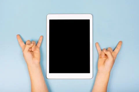 Tablet with child's hands Stock Photos