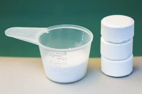 Tablet of chlorine and powder of bromide for mainteance of water quality of j Stock-Fotos