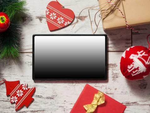 Tablet on Christmas background Stock Photos