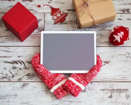 Tablet on Christmas background Stock Photos