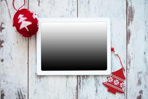 Tablet on Christmas background Stock Photos