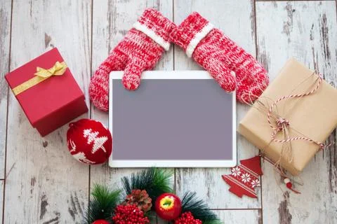 Tablet on Christmas background Stock Photos