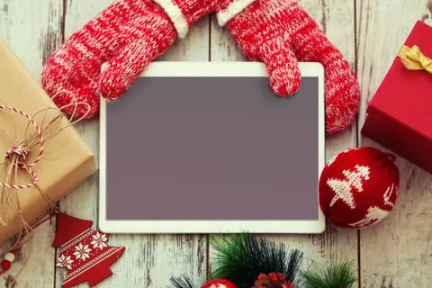 Tablet on Christmas background Stock Photos