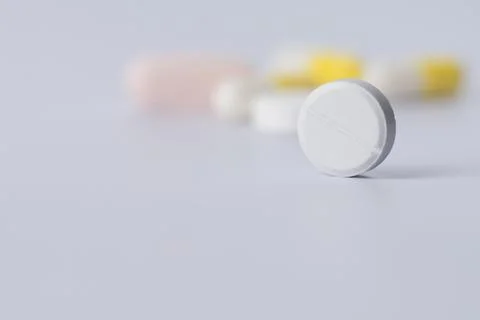 Tablet closeup on white background. Stock Photos