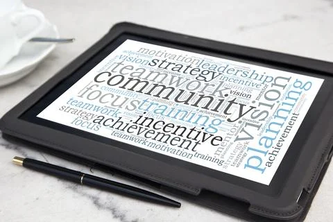 Tablet with community word cloud Stock Photos