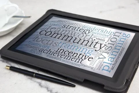 Tablet with community word cloud Stock Photos