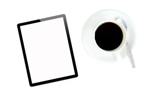 Tablet computer and hot coffee Stock Photos