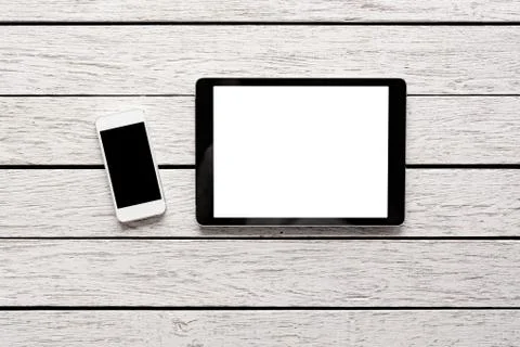 Tablet computer and white smart phone 写真素材