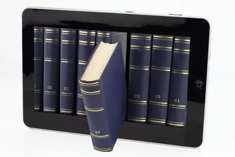 Tablet computer with books isolated on white Stock Photos