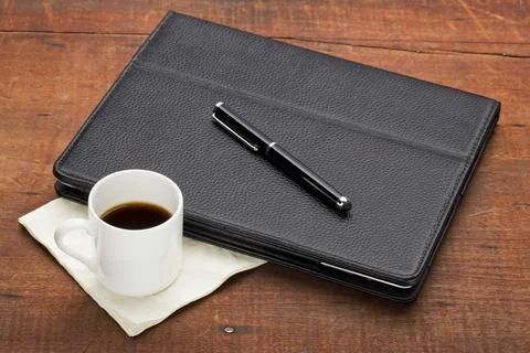  tablet computer with coffee tablet computer in leather case with stylus p... Stock Photos
