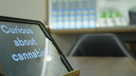 Tablet computer curious about cannabis Stock Footage 105881003