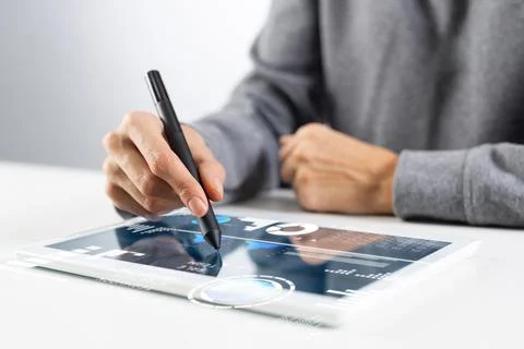 Tablet computer for financial data analysis Stock Photos