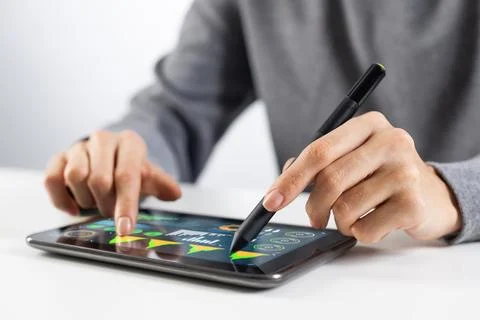 Tablet computer for financial data analysis Stock Photos