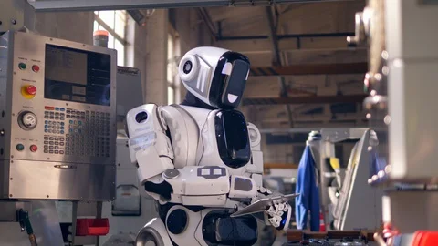 Tablet computer is getting operated by a robot Stock-Footage 106846373