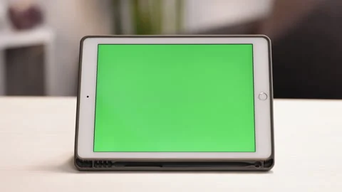 Tablet Computer with Green Screen and Chroma Key for Copy Space. Chromakey Mock Stock Footage 194809638